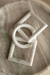 Catena geometrica in marmo