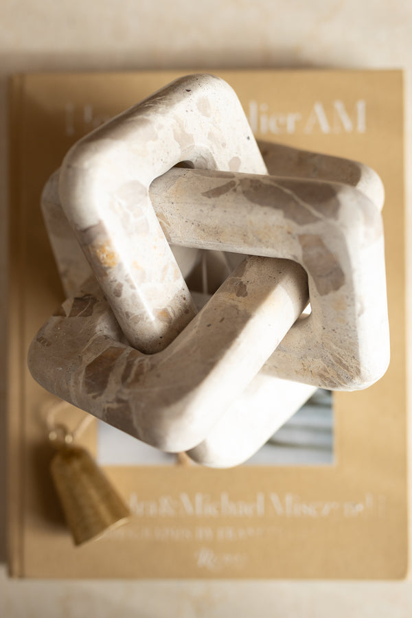 Nodo intrecciato in marmo  travertino