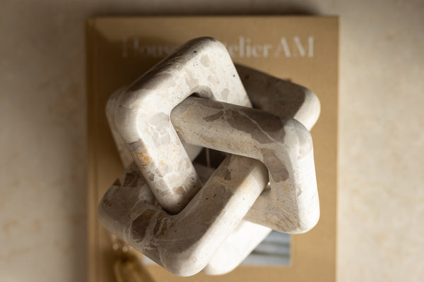 Nodo intrecciato in marmo  travertino